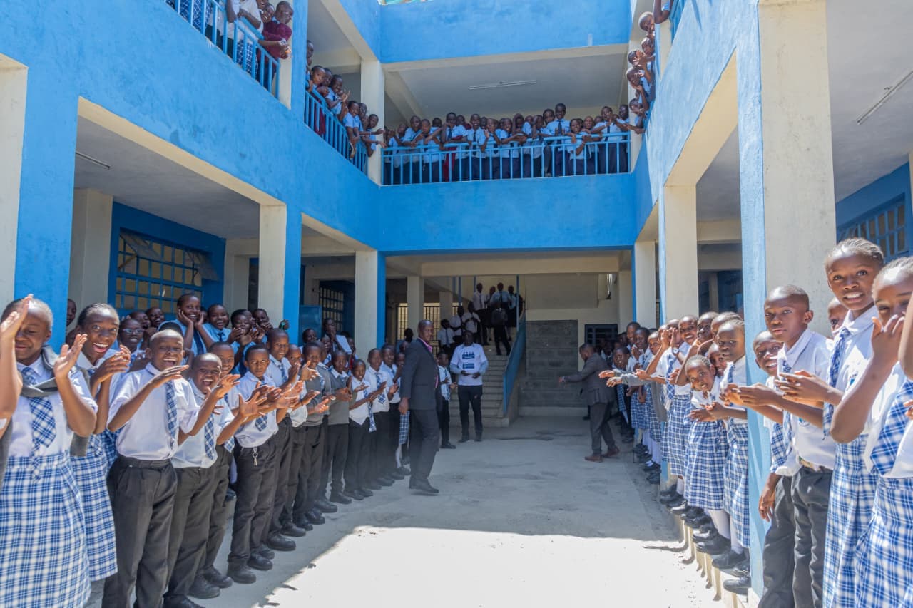 Students celebrating the opening of the new block and exam success